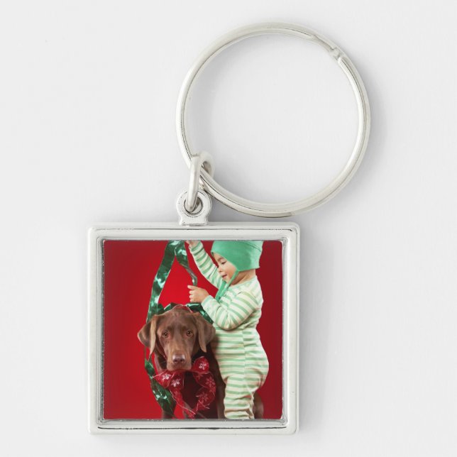 Little boy decorating a dog key ring (Front)