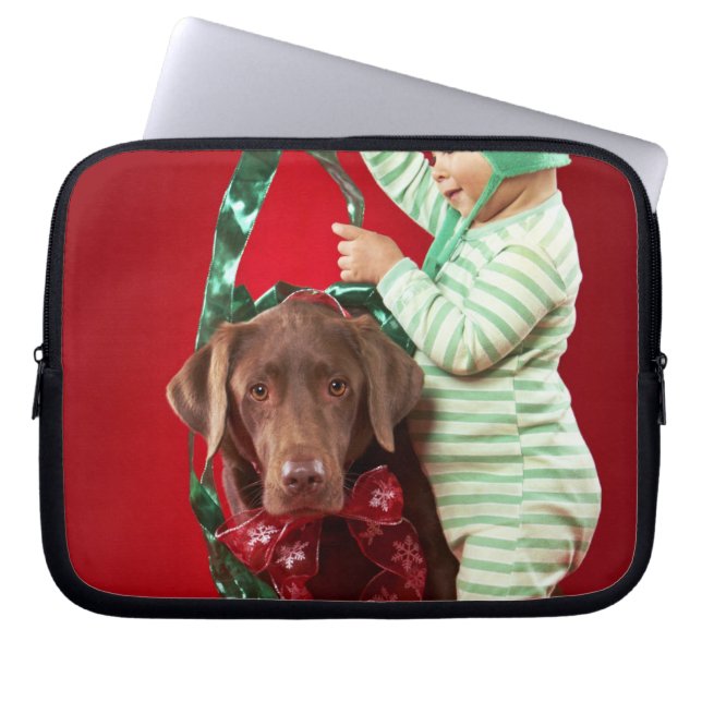 Little boy decorating a dog laptop sleeve (Front)
