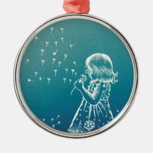 Little girl blowing on a dandelion metal tree decoration
