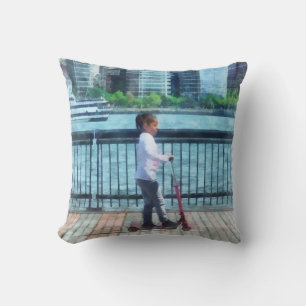 Little Girl on Scooter by Manhattan Skyline Cushion