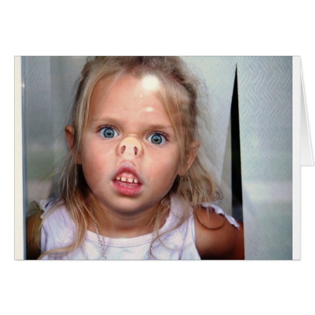 Little girl pressing her nose against a window (Front Horizontal)