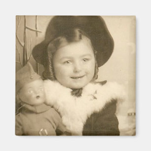 little girl with doll magnet