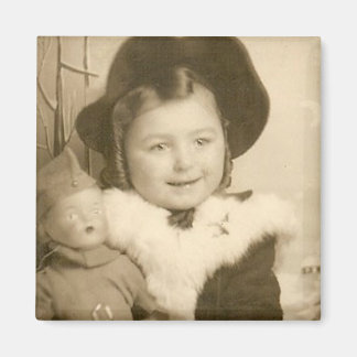 little girl with doll magnet