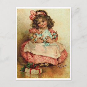 Little girl with her doll and Christmas gift Postcard