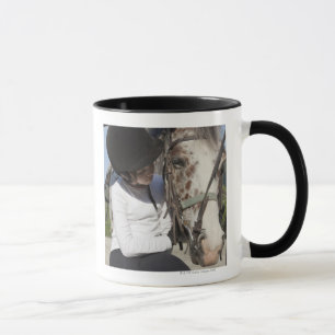 Little girl with her horse mug