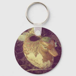 Little Glass Pie Duck Sitting in a Garden Key Ring