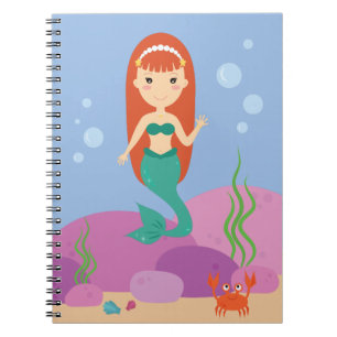 Little mermaid girl underwater waving notebook