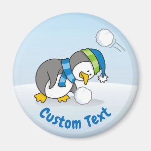 Little penguin getting a snow ball magnet