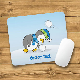 Little penguin getting a snow ball mouse pad