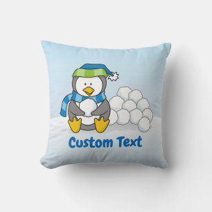 Little penguin sitting with snowballs cushion
