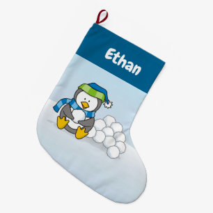 Little penguin sitting with snowballs large christmas stocking