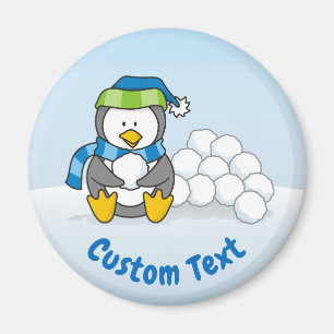 Little penguin sitting with snowballs magnet