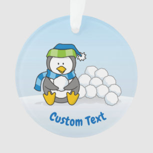 Little penguin sitting with snowballs ornament