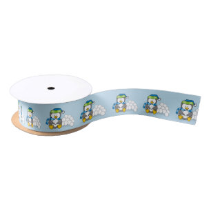 Little penguin sitting with snowballs satin ribbon