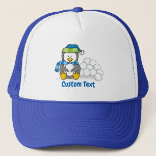 Little penguin sitting with snowballs trucker hat