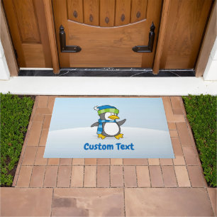 Little penguin walking on snow doormat