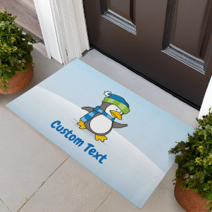 Little penguin walking on snow doormat