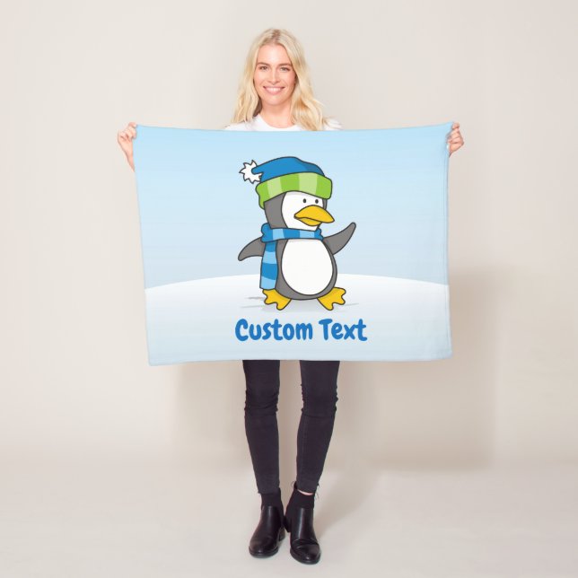 Little penguin walking on snow fleece blanket (In Situ)