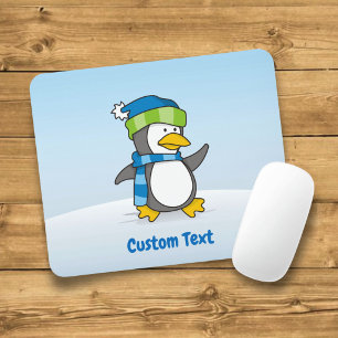 Little penguin walking on snow mouse pad