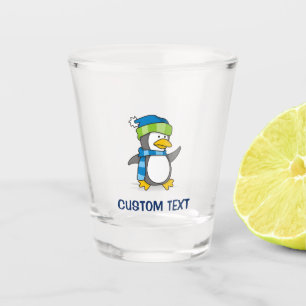 Little penguin walking on snow shot glass