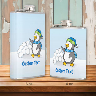 Little penguin with snow balls waving hip flask