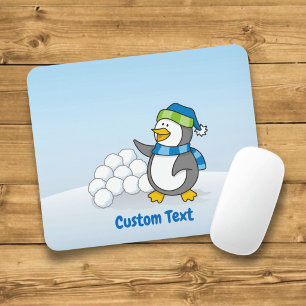 Little penguin with snow balls waving mouse pad