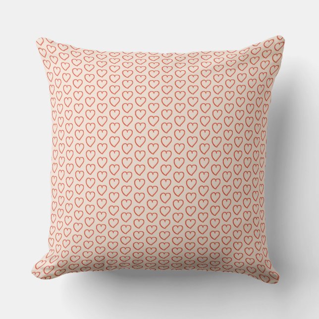 Little red hearts on pastel pink cushion (Front)