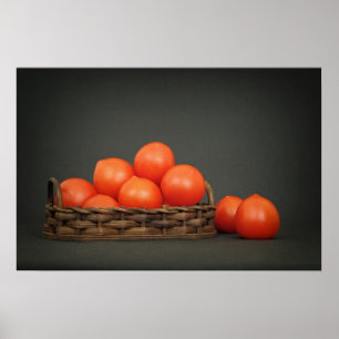 Little red tomatoes in a basket on dark table poster