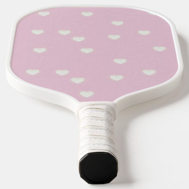 Little white hearts on pink pickleball paddle (Laydown)