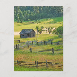 Little wooden barn on farm postcard
