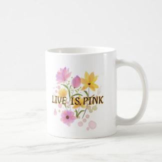 "LIVE IS PINK" is written in a dark Coffee Mug