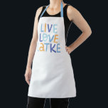 Live Love Latke Hanukkah Design Apron<br><div class="desc">Celebrate the joy of Hanukkah with this colourful "Live Love Latke" design. Featuring bright colours and playful typography,  this graphic is perfect for a variety of products,  from home decor to gifts. Add a touch of holiday spirit and deliciousness to your space with this fun and festive design.</div>