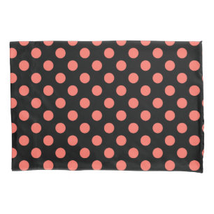 Living coral polka dots on black pillowcase