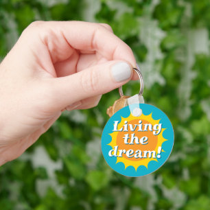 Living the dream keychain with sunny logo