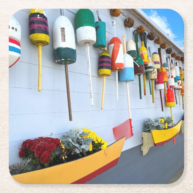 Lobster buoys on a building in Gloucester MA Square Paper Coaster (Front)