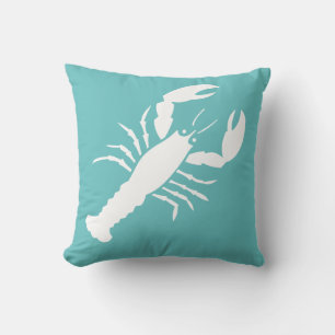 LOBSTER WHITE on teal blue pillow