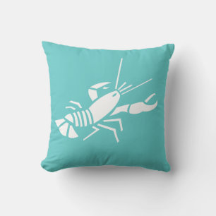 LOBSTER WHITE on teal blue pillow