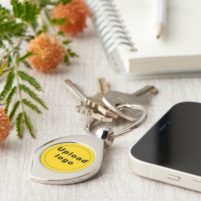 Logo With Yellow Background on Swirl Metal Key Ring (Side)