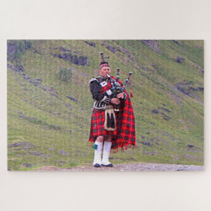 Lone Scottish bagpiper, Highlands, Scotland Jigsaw Puzzle