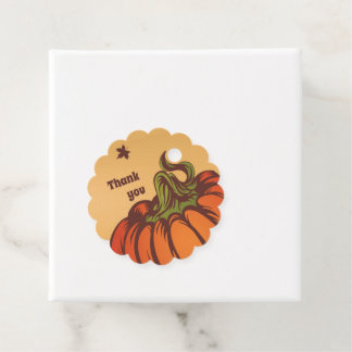 Lonely pumpkin one the field. Autumn leaves fall. Favour Tags