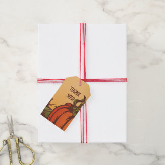 Lonely pumpkin one the field. Autumn leaves fall. Gift Tags