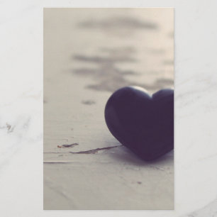 Lonely Purple Stone Heart on a Wet Sandy Beach Stationery