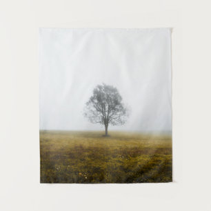 Lonely tree in a foggy autumn morning tapestry