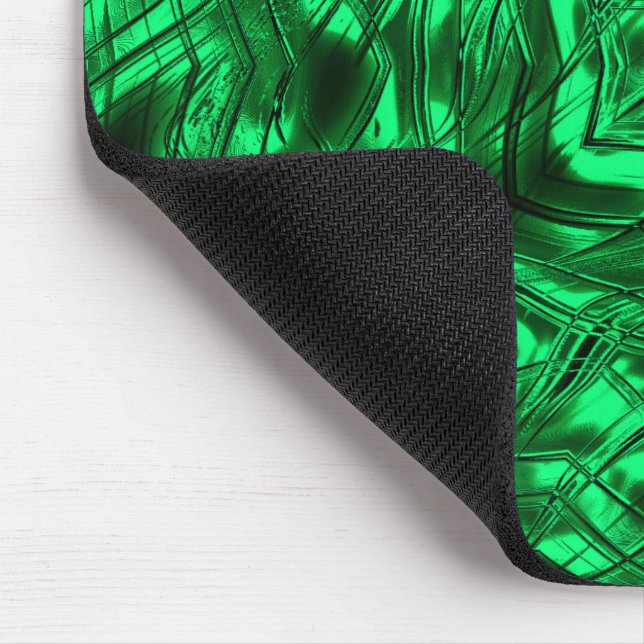 Long curved strokes forming star on green metallic mouse mat (Corner)