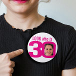 Look who is 30 photo pink white 30th birthday 7.5 cm round badge<br><div class="desc">Celebrate an 30th Birthday with this fun bright pink and white look who is 30 add your own photo badge/button. Personalise this milestone three decades age badge with a photograph of the birthday boy or girl. Great idea for adding some photo fun to a birthday party. Can be used to...</div>