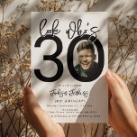 Look who's 30 | Photo 30th Birthday Invitation<br><div class="desc">Celebrate the big 3-0 in style with our customisable and chic 30th birthday invitation! This cleanly designed invitation plays with bold, black typography and a classic white background to emphasise the milestone you've reached. Incorporate your favourite photo into the design, tucked within the zero of '30', setting a personal and...</div>