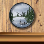 Loon Clocks<br><div class="desc">A pair of Loons drifting on lake is the art featured on these wall clocks.</div>