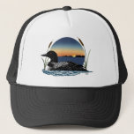 Loon Sunset Blue Trucker Hat<br><div class="desc">A loon on a lake with a sunset in behind and cattails in a backdrop of blue</div>