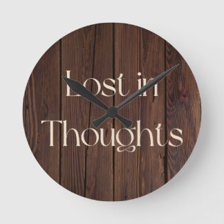 Lost in Thoughts Round Clock