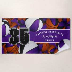 Lots of basketballs purple black team colours beach towel